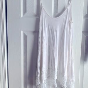 white long tank top with design on the bottom